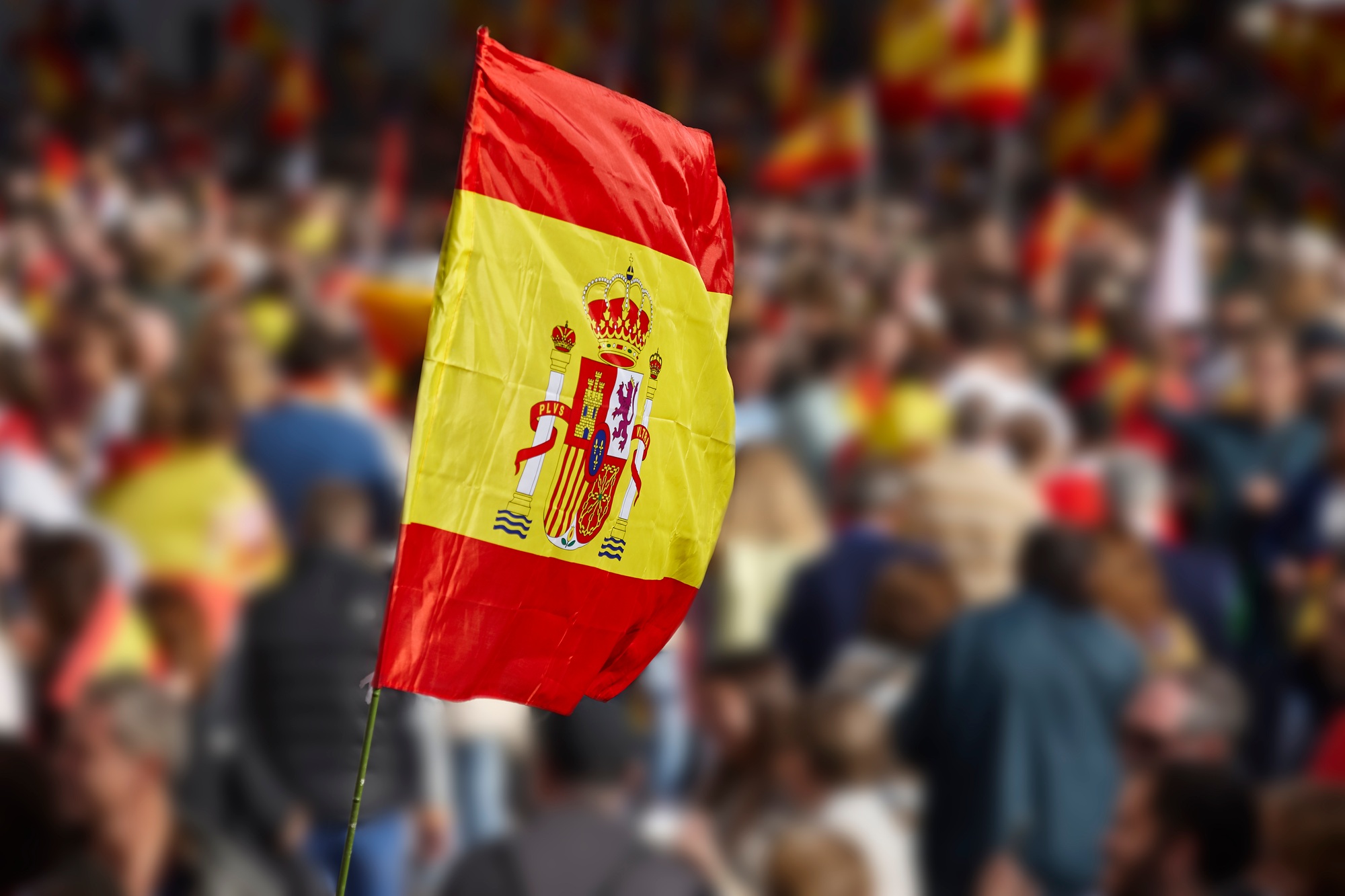 Spanish flag waving. Demonstration in Spain. Spanish symbol