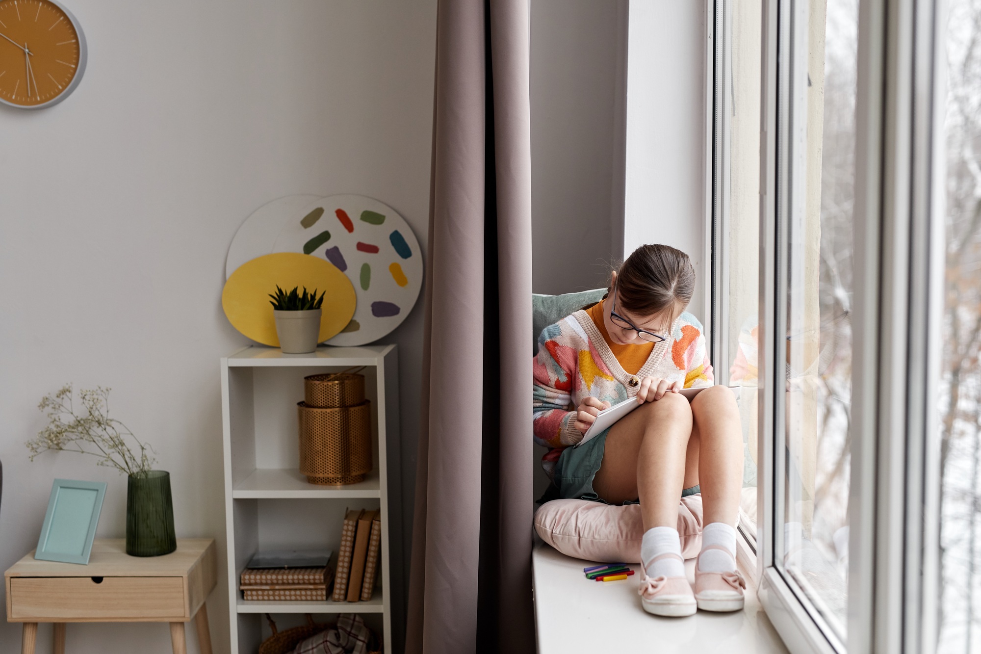 Girl With Down Syndrome Drawing By Window