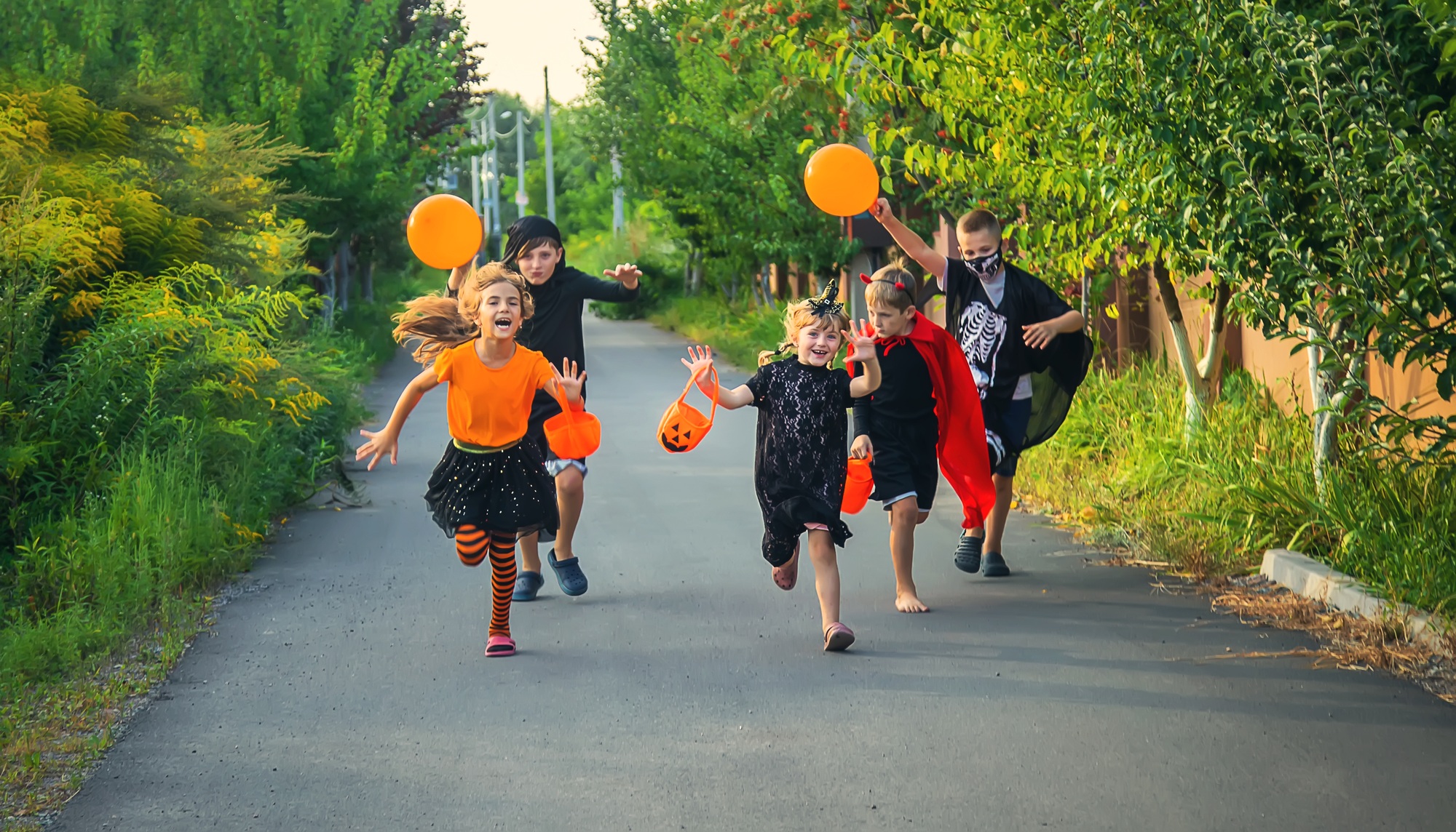 Children celebrate Halloween dressed up in costumes. Selective focus.