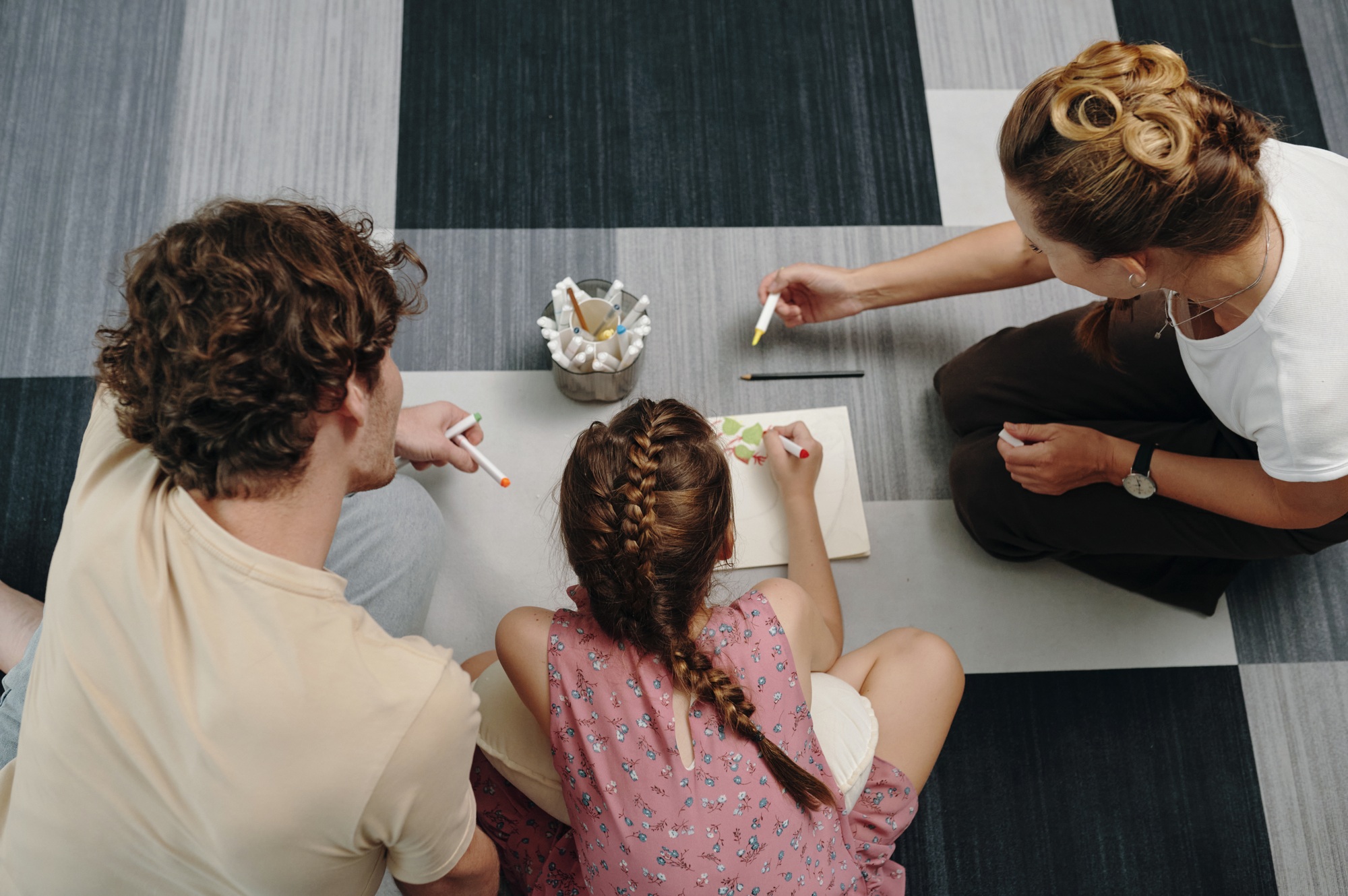 Family Drawing Picture With Child At Home